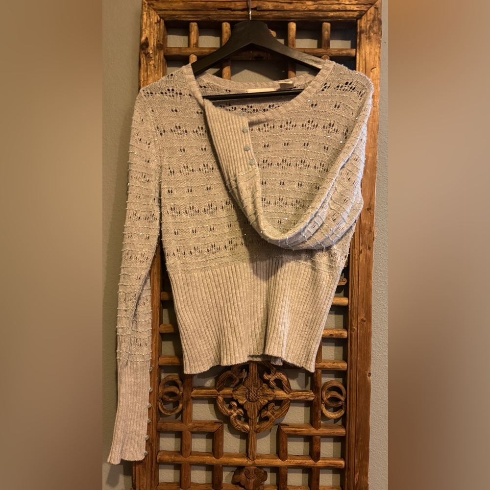 Elegant Cream Women's Sweater Sleeping on Snow